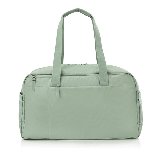 A green duffle bag with two handles and a zipper closure, featuring a logo on the front.