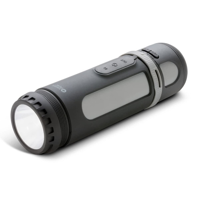 A grey Swiss Peak 4-in-1 speaker, designed like a flashlight, features buttons and a clear lens at one end.