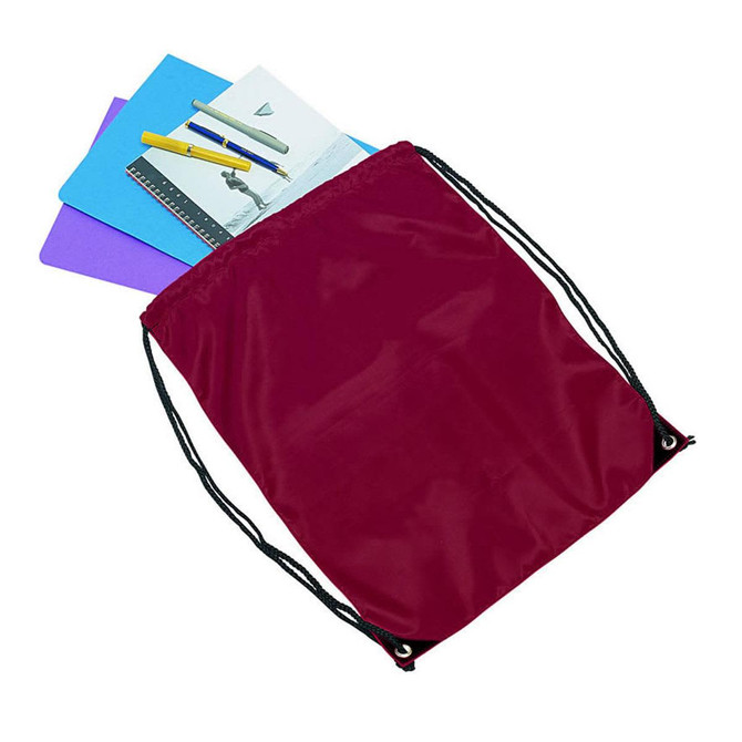 A maroon drawstring bag filled with colourful notebooks and stationery items. The bag features a logo.