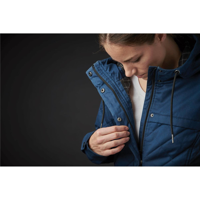 A women's puffer jacket in blue, featuring a quilted design and a zippered front, with a hood and logo.