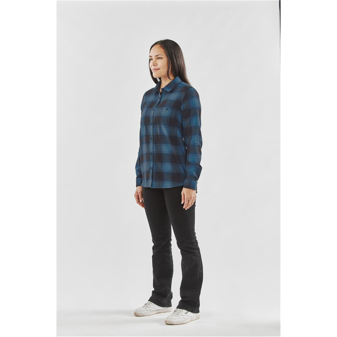 A button-up shirt in a blue and black check pattern, modelled by a woman with long hair, set against a plain background.