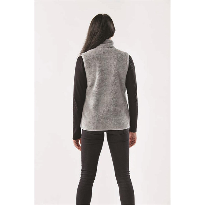 A grey women's Sherpa fleece vest with a high collar, featuring a logo, viewed from the back.