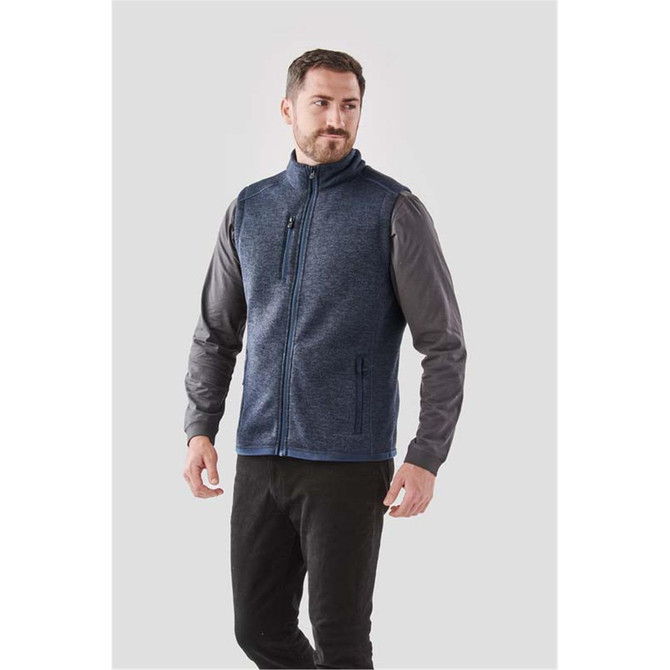Men's Avalante Full Zip Fleece Vest in navy and grey, featuring a zippered front and side pockets. Includes a logo.