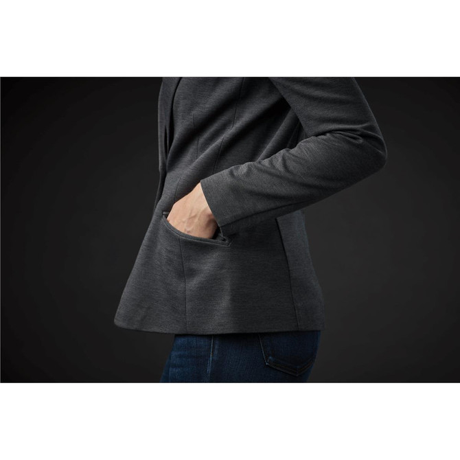 A grey women's knit blazer featuring a fitted design and side pockets, shown from a side angle.