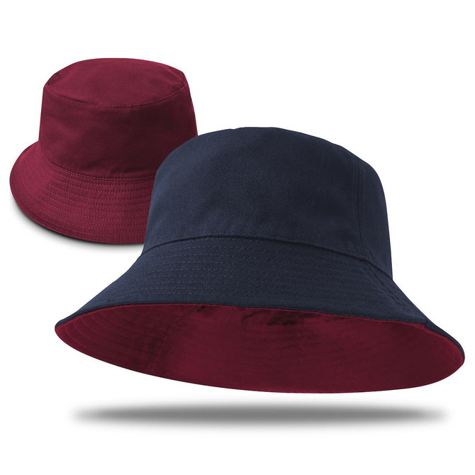 A reversible bucket hat featuring a navy exterior and a burgundy interior, with a logo present.