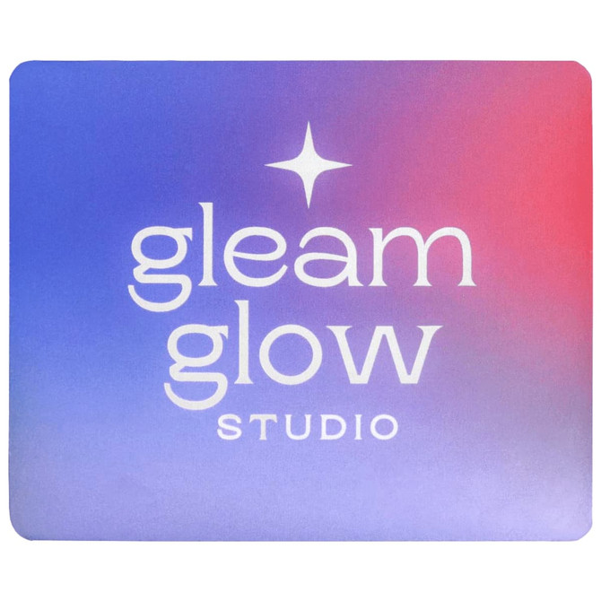 A mouse pad featuring a gradient design in purple and pink with a logo in the centre.
