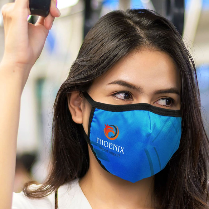 A reusable face mask in shades of blue with a logo prominently displayed.