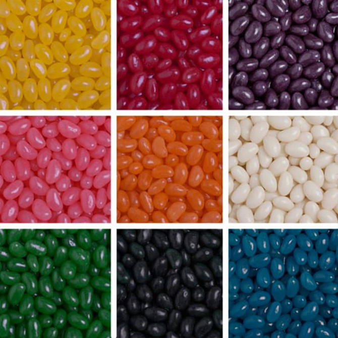 A collection of colourful jelly beans in various shades, arranged in a grid, featuring yellow, pink, orange, green, and more.