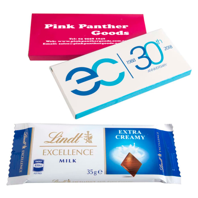 A printed box featuring a Lindt 35g chocolate bar in a blue and gold wrapper, alongside two other promotional boxes.
