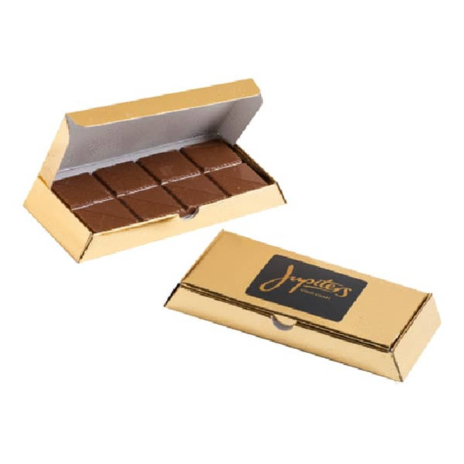 A gold bullion box containing several rectangular milk chocolate pieces inside. The box features a logo.