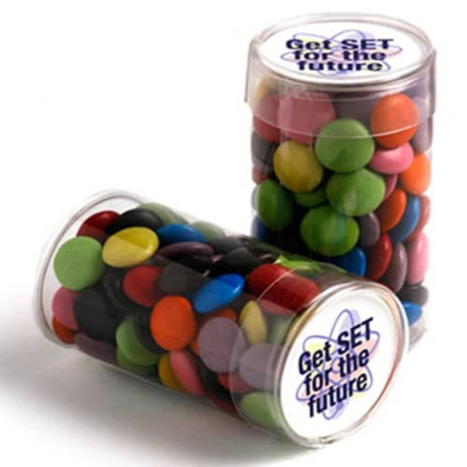 Two clear containers filled with brightly coloured chocolate beans in various shades, featuring a logo on the lid.