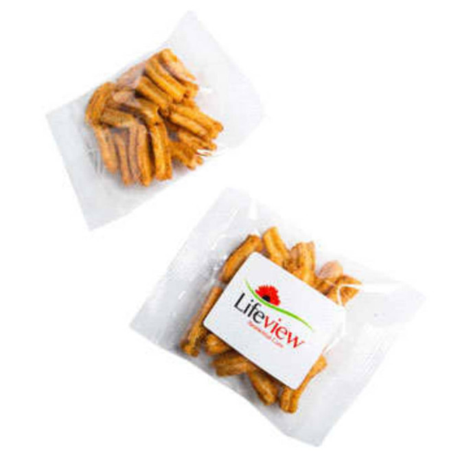 A clear plastic bag contains golden-brown Soya Crisps, with a logo on the packaging.