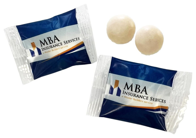 Two individually wrapped mints in blue packaging, accompanied by two round, white mints.