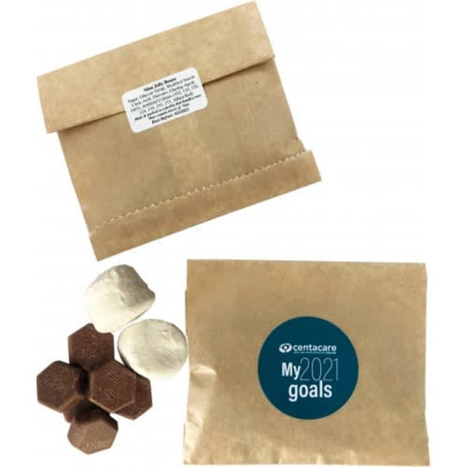 A kraft paper bag containing Lindt buttons and marshmallows, with a logo on the front.