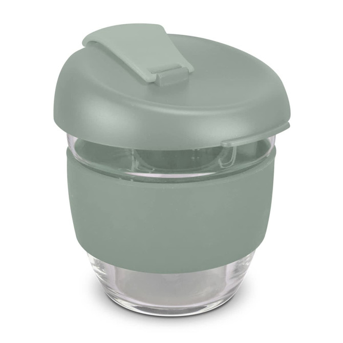 A drink bottle featuring a clear borosilicate glass body with a green silicone lid and sleeve. It has a logo.