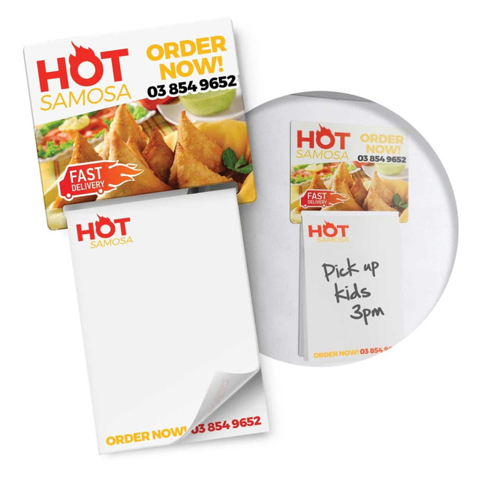 A magnetic memo pad in full colour featuring a logo, with a notepad and a note attached.