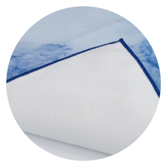 A large promotional product featuring a blue and white patterned cover with a contrasting edge. It has a logo.