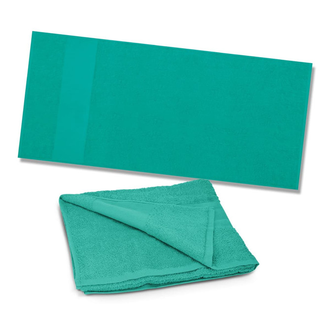 A teal beach towel neatly folded with a flat, unfolded view beside it. The towel has a logo.