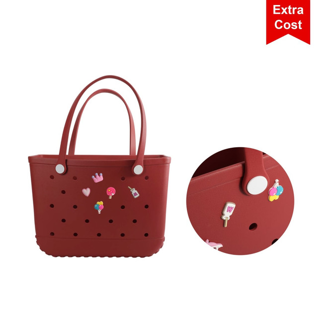 A red EVA beach bag features a perforated design and decorative embellishments. It has long handles and a logo.