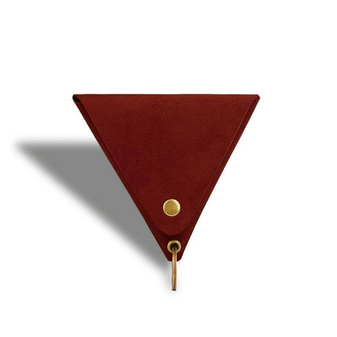 A triangular red coin holder made of leather with a keyring attachment and a brass button.