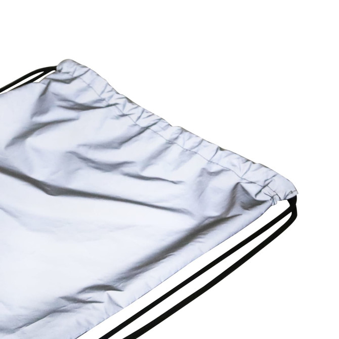 A reflective drawstring bag in silver with black drawstrings, featuring a simple design and no visible logos.