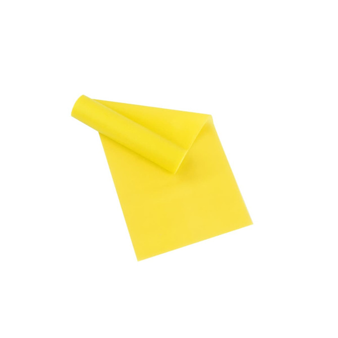 A yellow latex-free TPE fitness resistance band rolled and laid flat, suitable for sports and exercise.