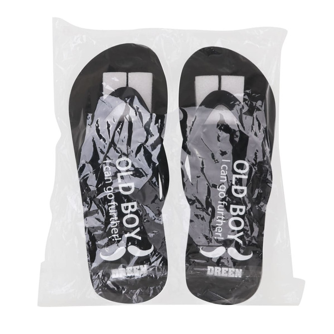 Black EVA classic thongs in protective packaging, featuring a logo and a simple design.