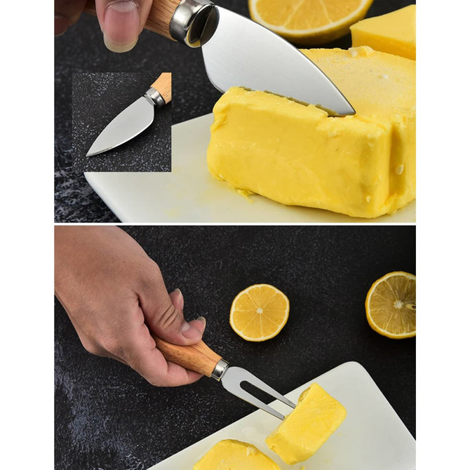 A butter knife with a wooden handle cutting through yellow butter, surrounded by halved lemons on a dark surface.