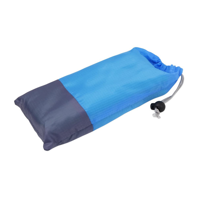 A blue and navy pouch containing a large picnic blanket, with a drawstring closure and a toggle.