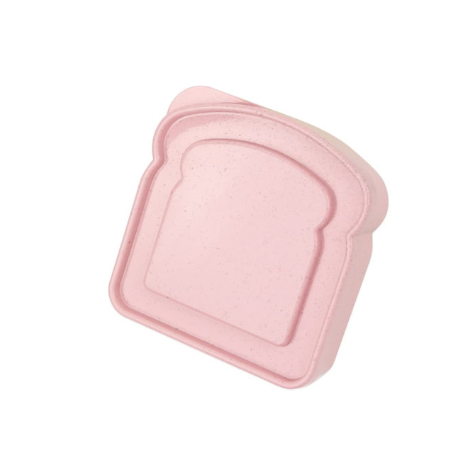A pink portable lunch box shaped like a slice of bread, made from bamboo fibre, featuring a logo.