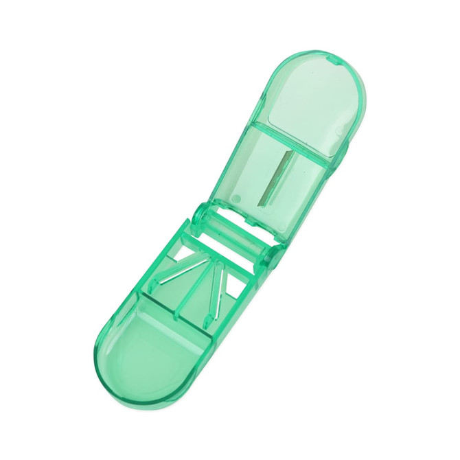 A green pill box with a cutter feature, designed for medication storage and organisation.
