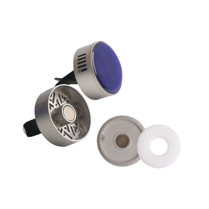 A car clip air freshener in silver and purple with interchangeable parts and a metallic finish. It includes a logo.