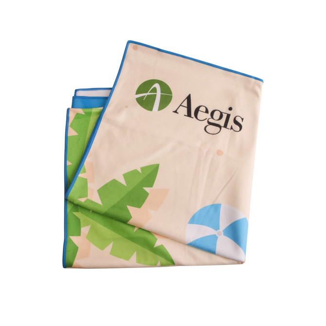 A microfibre beach towel in cream, featuring a colourful tropical design and a logo. Size: 80x160cm.
