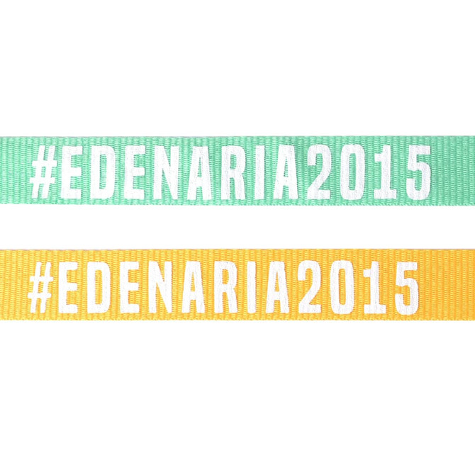 Two poly ribbed lanyards, one in mint green and one in bright yellow, both featuring printed text.