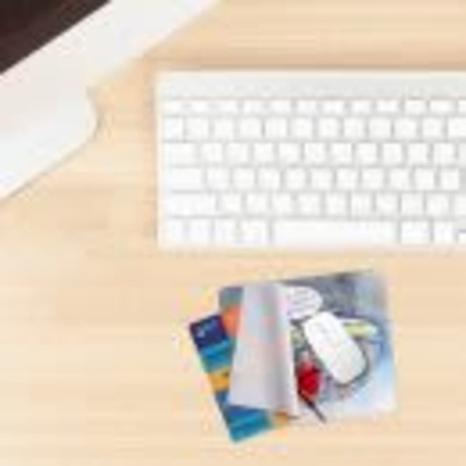 A 3-in-1 microfibre cleaning mouse pad in blue with a logo, alongside a computer keyboard and credit cards on a desk.