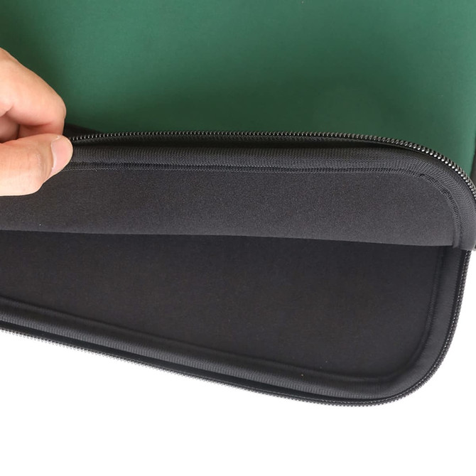 A green laptop bag with a black interior, featuring a zip closure and hand placement on the edge.