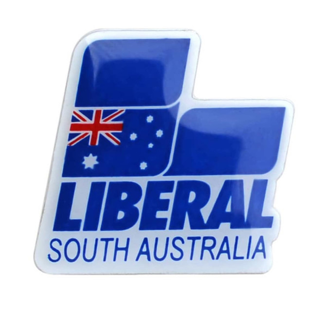 A lapel pin featuring a blue design with the Australian flag and the text "LIBERAL SOUTH AUSTRALIA."