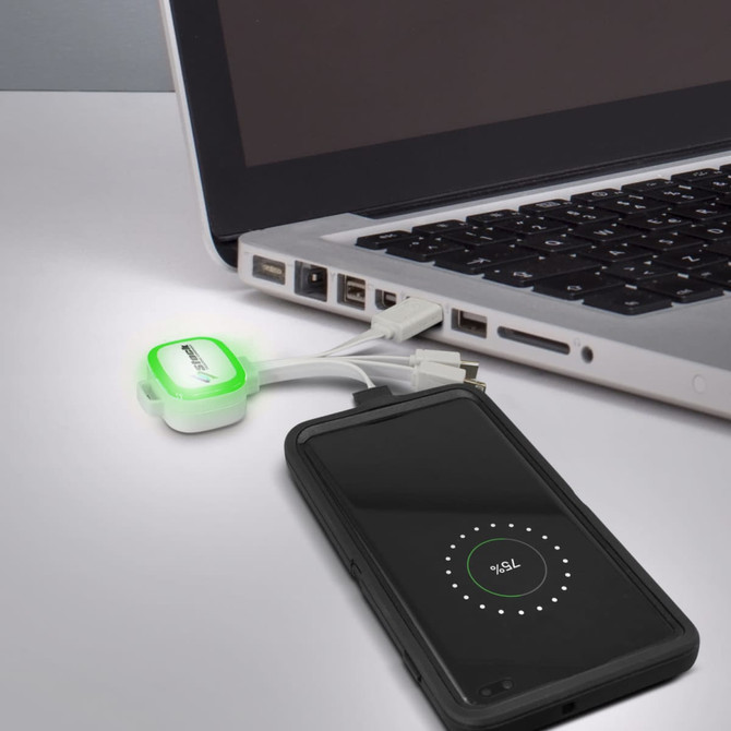 A white Zodiac Charging Cable connects to a laptop, with a smartphone displaying a charging indicator.