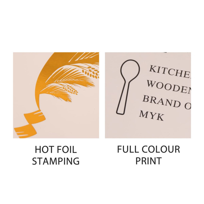 A close-up view of packaging featuring hot foil stamping in gold and full colour print details.
