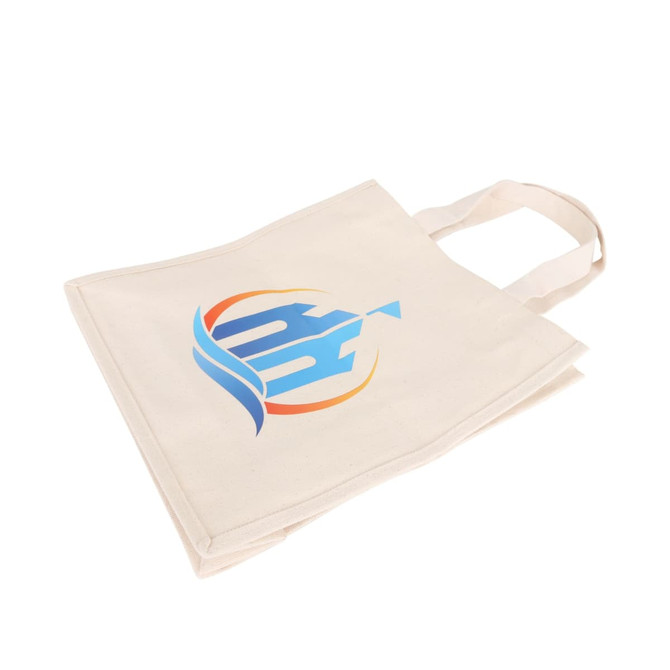 A cream cotton tote bag with a logo printed in blue and orange, featuring dual handles for carrying.