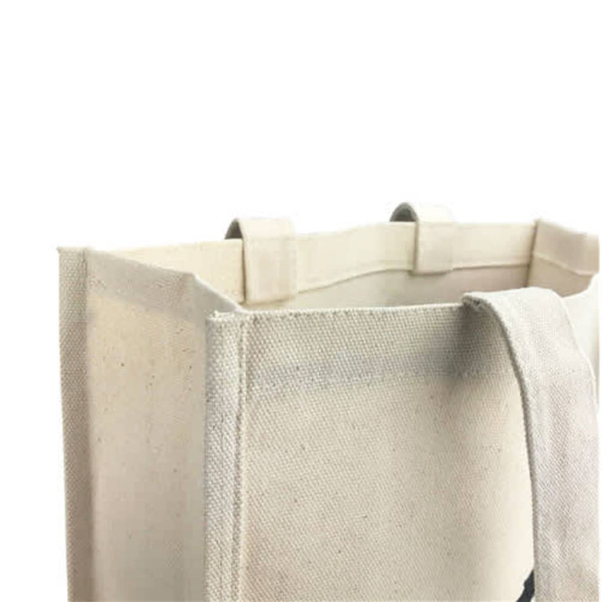 A cream-coloured cotton tote bag with sturdy handles and visible stitching. It features a logo on one side.