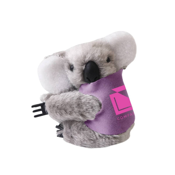 A grey koala plush toy with large ears and a purple vest, holding a small fork, featuring a logo.