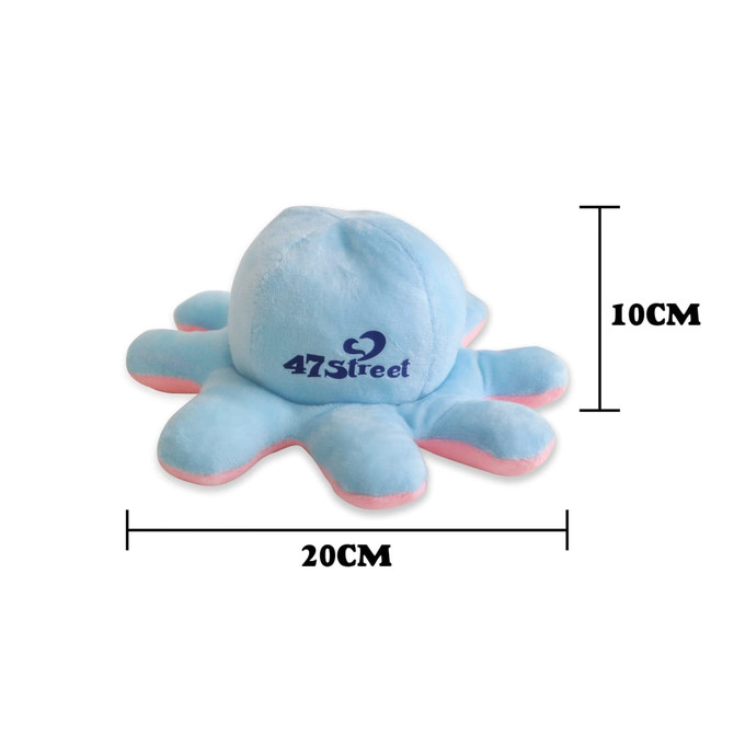 A large reversible plush toy in light blue and pink, shaped like an octopus, featuring a logo. Measures 20cm wide.