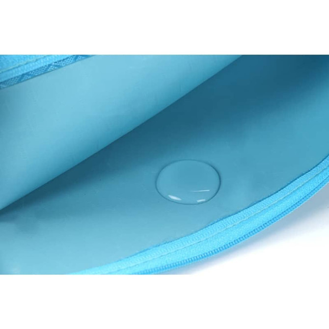 An open blue Zip Bag featuring a smooth interior surface with a small water droplet visible.
