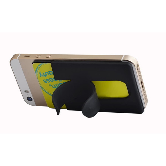 A black wallet stand attaches to a phone, holding a card, positioned against a light background.