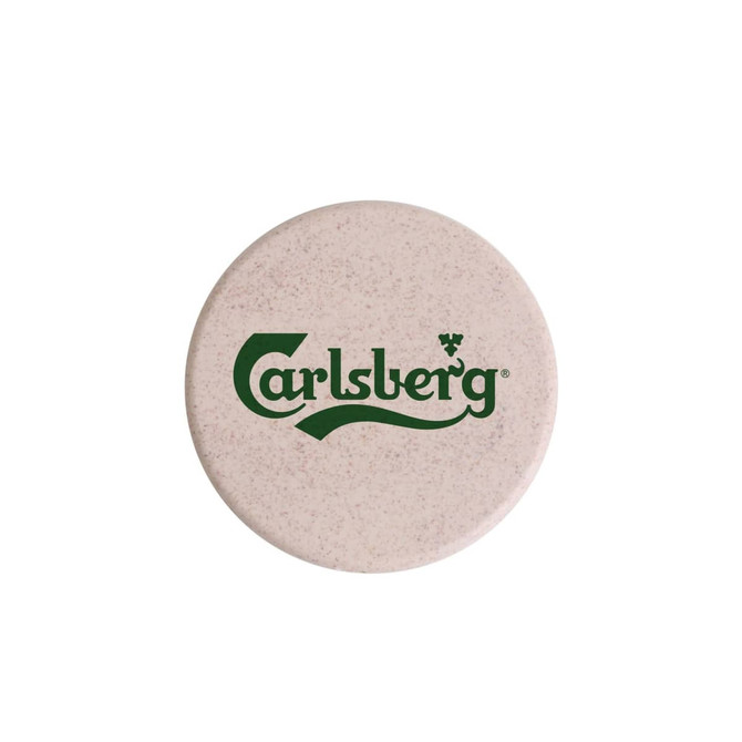 A round wireless charger in a light beige colour with a logo prominently displayed.