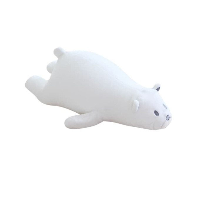 A white bear-shaped travel pillow with small ears and a simple face design, featuring a soft, plush surface.