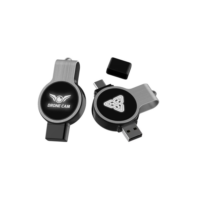 A dual-ended swivel flash drive in silver and black, featuring two connectors and a logo on each side.