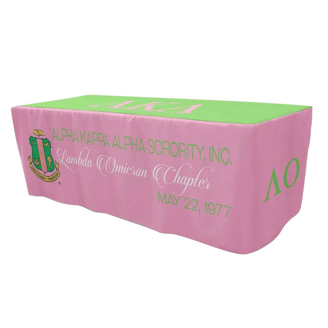 A pink and green 4-side fitted table cloth featuring a logo and text for Lambda Omicron Chapter.