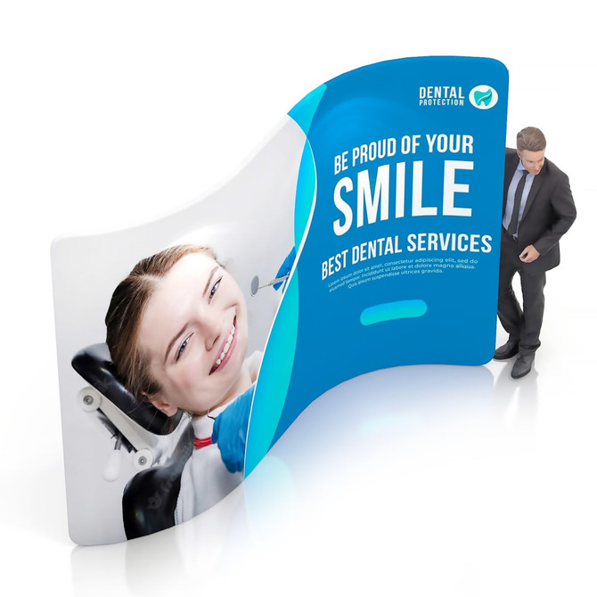 A curved, vibrant display wall featuring a smiling woman in a dental chair, with a logo and professional design.
